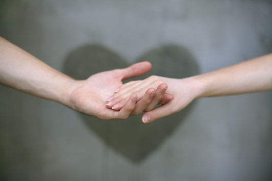 What Does It Mean When a Guy Plays with Your Hand and Fingers?