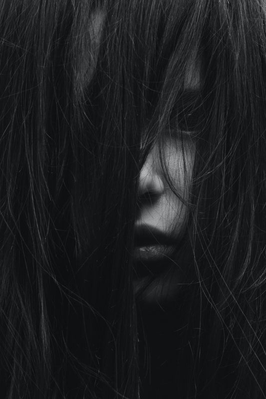 What Does It Mean When A Girl Covers Her Face With Her Hair