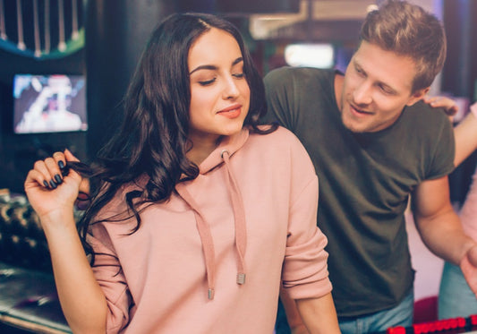 What Does It Mean When A Girl Fixes Her Hair Around You