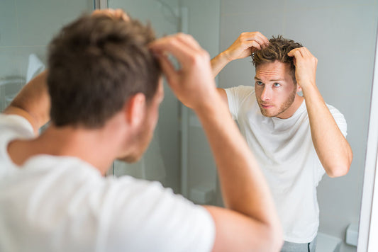 When A Guy Fixes His Hair