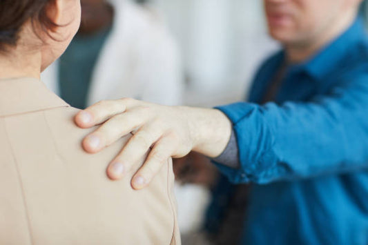What Does It Mean When a Guy Pats Your Shoulder?