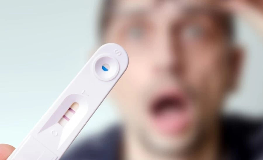 What Does It Mean When a Guy Pees on a Pregnancy Test and It Comes Back Positive?