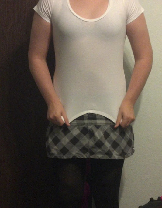 What Does It Mean When A Girl Pulls Her Shirt Down